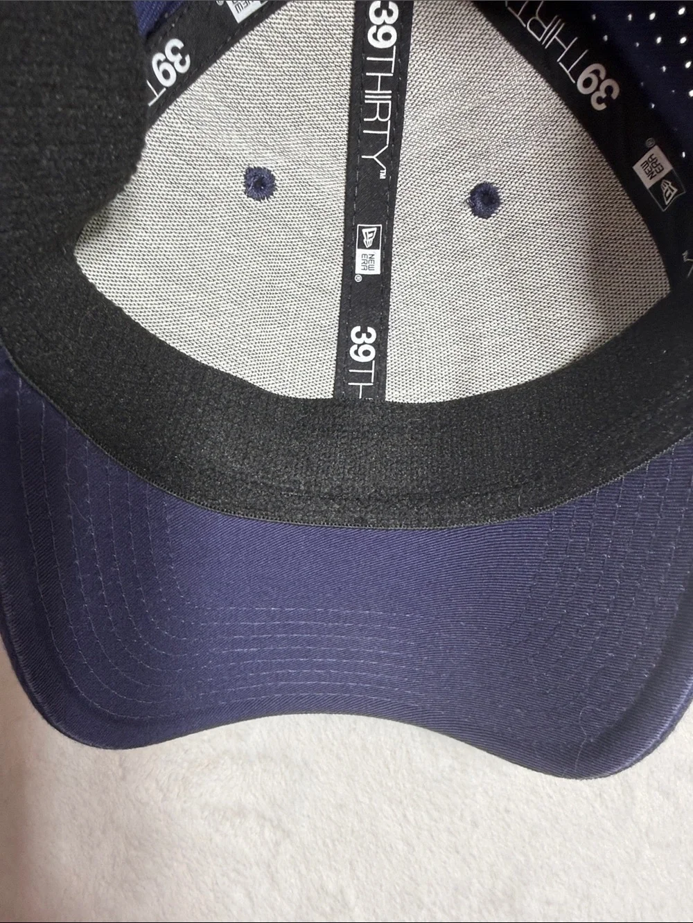 Navy Vancouver Canucks Baseball Cap with Green & Blue Embroidered Logo